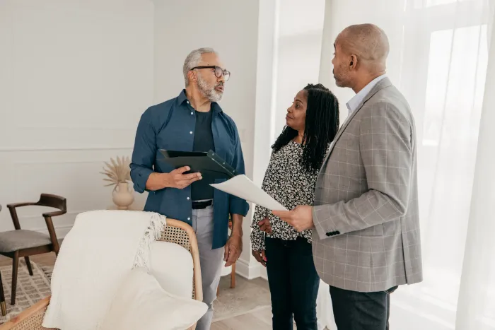 Final walkthrough of a completed garden suite with homeowners and the Home Garden Suites team, backed by a 2-year workmanship warranty