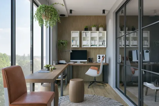Garden suite home office nook with glass walls and a built-in desk